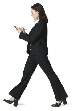 Photodisc/Photodisc/Getty Images CAOs and CFOs are high-level executives with broad responsibilities.