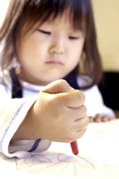 Use a variety of techniques to teach your preschooler to write.