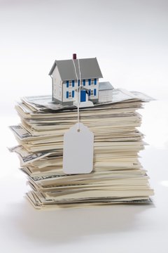 Creatas/Creatas/Getty Images The down payment is a lump sum based on home price.