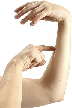 NA/PhotoObjects.net/Getty Images Your forearms play a big role in your grip strength.