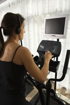 Jupiterimages/Comstock/Getty Images Your heart rate indicates your intensity level on the elliptical.