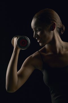 Jupiterimages/Photos.com/Getty Images Strength train three times a week for a full-body workout.
