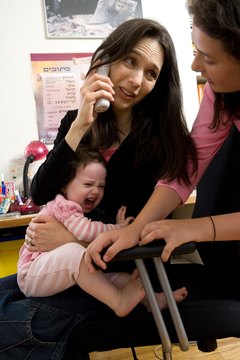 Jupiterimages/Photos.com/Getty Images Single moms who work full-time are sometimes the victims of employment discrimination.
