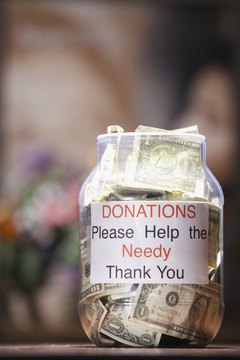Brand X Pictures/Brand X Pictures/Getty Images Donating stock from your IRA is tax-free.