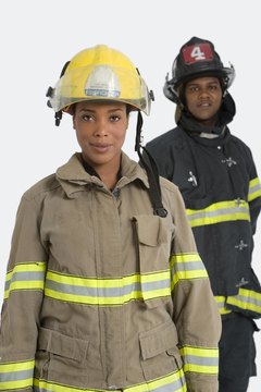 Jupiterimages/Creatas/Getty Images Firefighters don't run from danger.