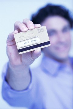 Stockbyte/Stockbyte/Getty Images Joint accounts can affect your credit report.