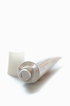 Jupiterimages/Photos.com/Getty Images You use triple antibiotics, and your cat can, too.