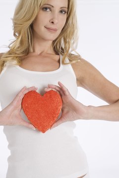 Creatas Images/Creatas/Getty Images You can protect your heart by eating foods that promote blood flow and prevent damange to your arteries.