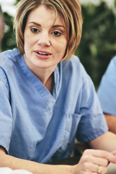 Ablestock.com/AbleStock.com/Getty Images Expect a world of meetings when you become a nurse.