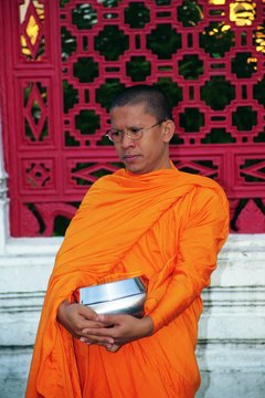 A Buddhist monk on morning alms round