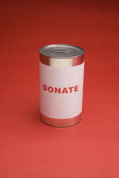 Jupiterimages/Comstock/Getty Images Contributions to most charities are deductible up to 50 percent of your adjusted gross income.