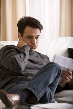 Comstock Images/Comstock/Getty Images High revolving balances hurts your credit and causes major financial stress.