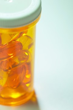 Photos.com/AbleStock.com/Getty Images Unless there is an important job-related reason, you are not required to disclose your medications to your boss.