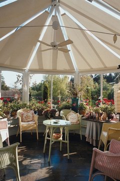 Jupiterimages/Photos.com/Getty Images Getting creative with your living space can run from a simple enclosed porch to an opulent sunroom.