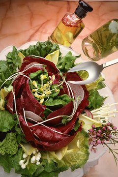Jupiterimages/Comstock/Getty Images Grape seed oil is a healthy, flavorful alternative for use in salad dressings.