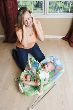 Jupiterimages/Creatas/Getty Images Having a baby shouldn't stop you from getting a home loan.