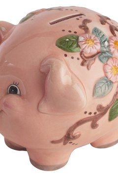 Hemera Technologies/PhotoObjects.net/Getty Images This little piggy can't help you finance a house.