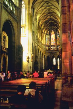 People choose from a selection of bidding prayers for a Catholic funeral.