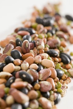 Jupiterimages/liquidlibrary/Getty Images Mature legumes are in two of the five main food groups.