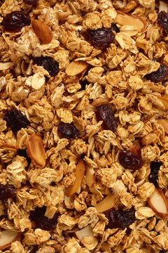Brand X Pictures/Brand X Pictures/Getty Images Dietary fiber is found in nuts, grains, legumes, fruits and vegetables.