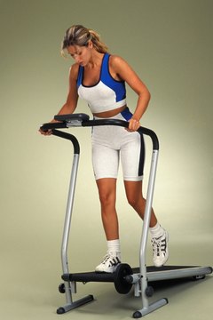 Medioimages/Photodisc/Photodisc/Getty Images Inclining your treadmill engages your glutes.