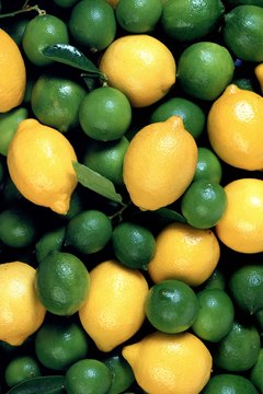 Jupiterimages/Comstock/Getty Images Lemons and limes counter the effects of iron-depleting nutrients.