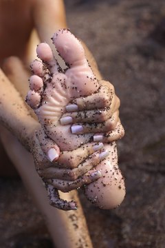 Thinkstock/Comstock/Getty Images Stretch your arch to keep your feet and legs pain-free.