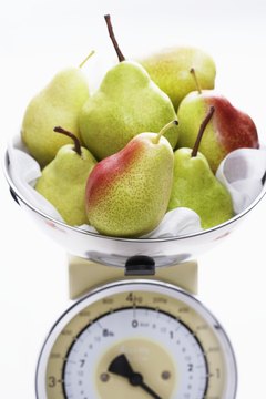 Martin Poole/Digital Vision/Getty Images Measuring food on a scale may help with portion control.