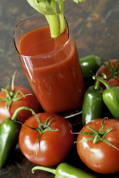 Jupiterimages/liquidlibrary/Getty Images Low-sodium tomato juice is a high-potassium beverage.