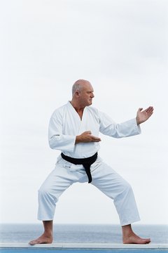 Polka Dot Images/Polka Dot/Getty Images Many kata -- or martial arts forms -- contain hidden pressure point strikes.