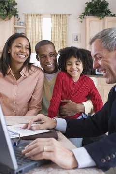 Jupiterimages/Comstock/Getty Images Tax-qualified money carries some sort of tax benefit.