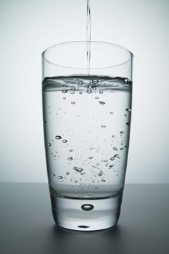 Jupiterimages/Comstock/Getty Images Water is a powerful tool in muscle recovery.