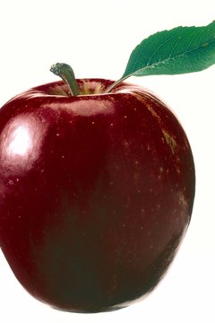 Jupiterimages/Comstock/Getty Images Eating apples promotes regular bowel movements.