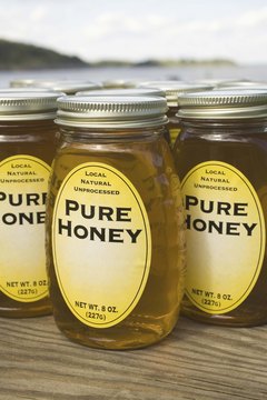 Jupiterimages/Brand X Pictures/Getty Images Use honey in moderation like any other sweetener.
