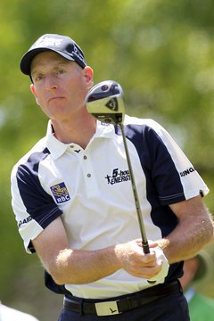 Jim "The Grinder" Furyk plays a shot at the 2012 Transitions Championship.