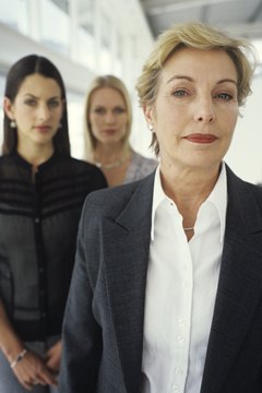 George Doyle/Stockbyte/Getty Images Mentors lead by example and personal coaching.