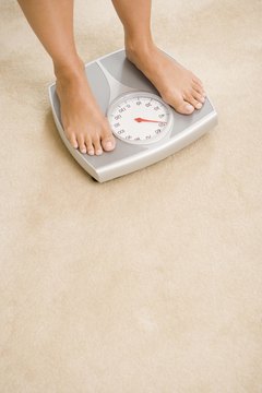 Jupiterimages/Polka Dot/Getty Images Even with regular exercise and a healthy diet, you can still gain weight.