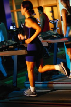 Ian Wyatt/Photodisc/Getty Images Mix some jogging with your walking to make treadmills more fun.