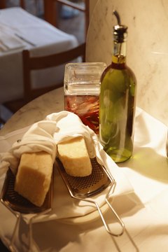 Jupiterimages/Comstock/Getty Images Traditional Italian food includes only small amounts of cheese.