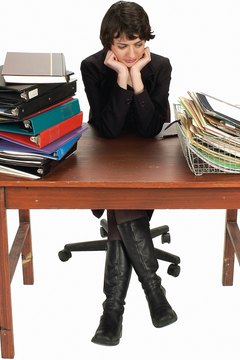 Zedcor Wholly Owned/PhotoObjects.net/Getty Images Organization is the key to tackling a heavy workload.