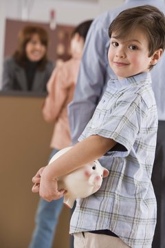 Jupiterimages/Comstock/Getty Images A college trust fund lets you start saving for your child's education early.