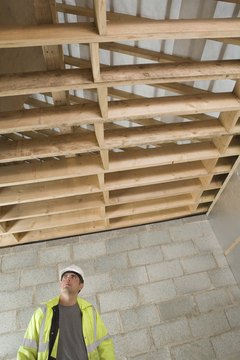 Jupiterimages/BananaStock/Getty Images Use structures in your home to do the hanging leg lift exercise.