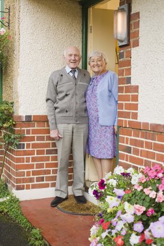 Jupiterimages/Polka Dot/Getty Images If you inherit their house, you accept responsibility for the mortgage too.