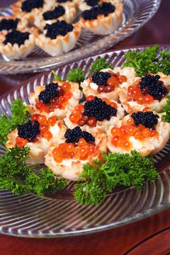 Jupiterimages/liquidlibrary/Getty Images Eat caviar in only small amounts because it's high in cholesterol.