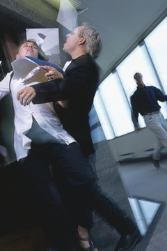 Hemera Technologies/Photos.com/Getty Images Carlessness and distraction lead to workplace accidents.