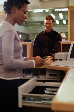 Ryan McVay/Photodisc/Getty Images Banks usually allow penalty-free withdrawals of CD interest.