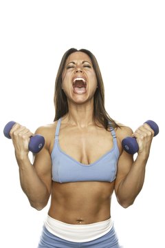 Jupiterimages/Photos.com/Getty Images Get rid of underarm flab with a weight-training workout.