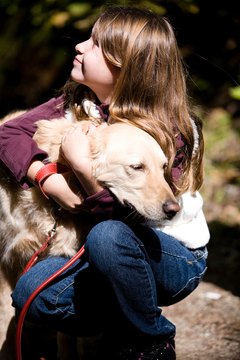 Jupiterimages/Photos.com/Getty Images Is there any doubt your dog truly loves you?