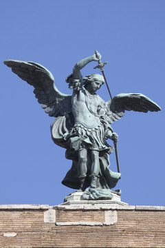 St. Michael Archangel statue on top of St. Angel castle in Rome.