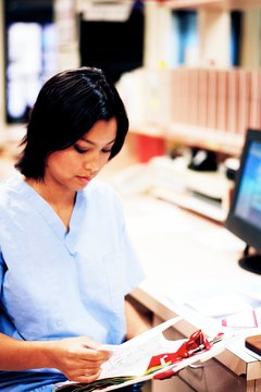 Jupiterimages/Photos.com/Getty Images An estimated 560,800 Americans worked as medical assistants in 2012, reports the Bureau of Labor Statistics.
